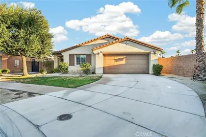 Front exterior and driveway of 84081 Azzura Way
