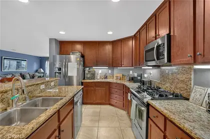 Kitchen with granite countertops and stainless appliances